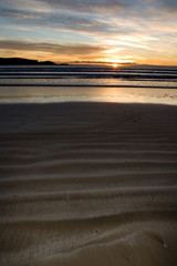 Beach Sunset across sand