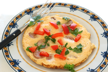 Omelet with sausages