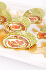 tasty appetizer with salmon and cheese