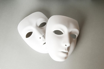 Theatre concept with the white plastic masks