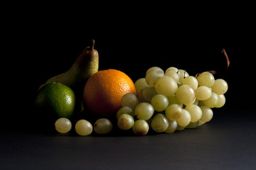 mixed fruit on a black background