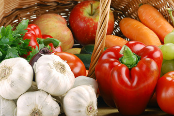 Raw vegetables and wicker basket