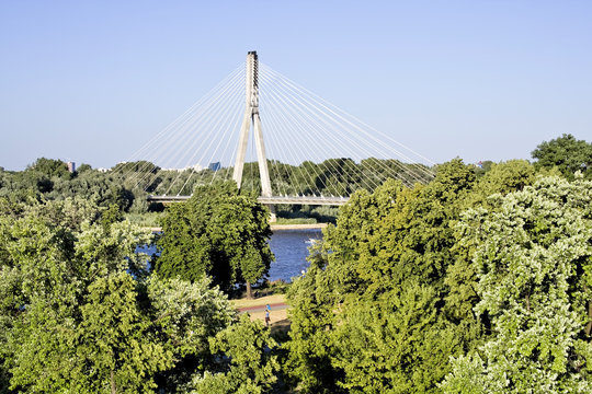 Warsaw - green city. Modern suspension bridge.