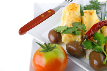 cheese cannelloni on white dish