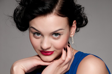 Fototapeta premium Closeup beautiful emotional glamour woman with red lips. Vogue