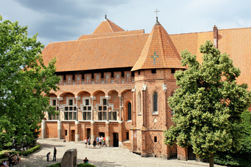 Fototapeta na wymiar Największy gotycki zamek. Malbork. Lista Światowego Dziedzictwa UNESCO.