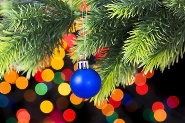 Christmas decoration and blurred lights at background