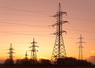 Electricity pylons and lines at dusk. - 26839017