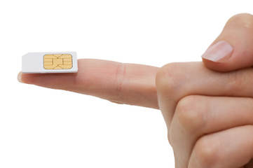 Sim card In a hand isolated on white background