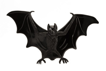 plastic toy bat over white