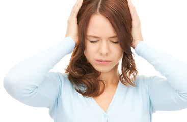 woman with hands on ears