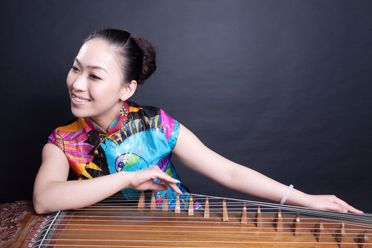 Girl Playing Chinese Zither