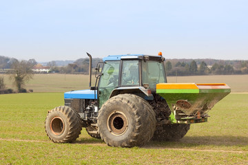 spreading fertilizer