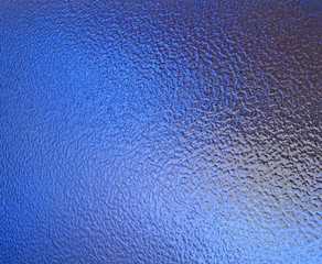 abstract glass blue background texture closeup, lighting