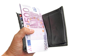 Hand holding a wallet with 500 euro banknotes