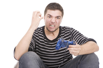 young man with joystick  and angry