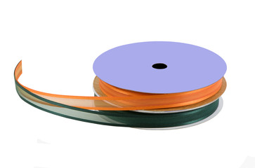 orange and green ribbon on a spool