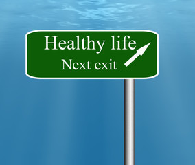 healthy life next exit sign post.