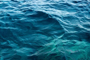Rolgordijnen Rippled blue water surface © fixer00