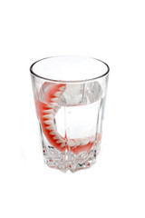 Denture in glass of water before sleeping