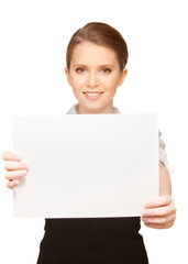 Fototapeta premium happy teenage girl with blank board