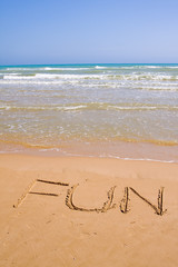 beautiful exotic beach in Mediterranean with a sign