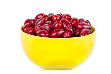 bowl with ripe Cornelian cherries