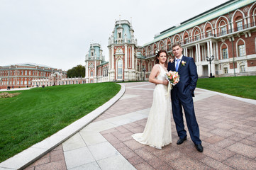 Bride and groom at a wedding a walk