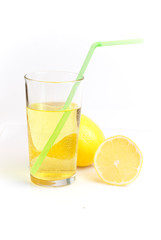 a glass of lemonade and lemon