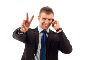 man making victory sign on phone