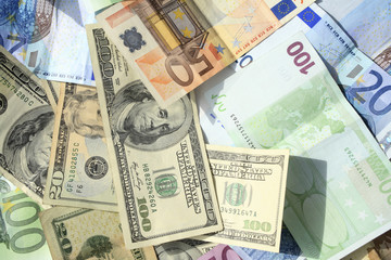 close up shot of American dollar and euro banknote
