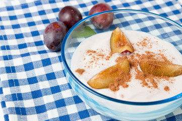 Fresh plum yogurt with cinnamon