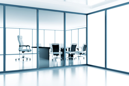 meeting room behind a glass partition in modern cubicle