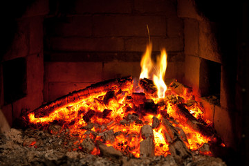 burning fire in the fireplace
