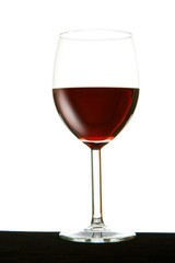 glass with red wine isolated on white