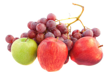 Naklejka na ściany i meble apples and grapes isolated on white
