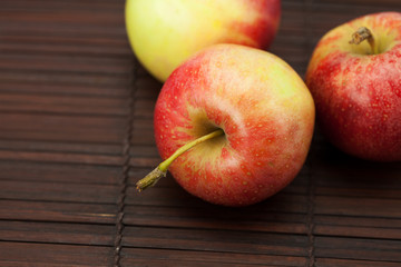 Apples on a bamboo mat