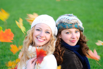 Two girl under the maple tree