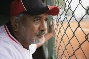 Baseball Player In Dugout