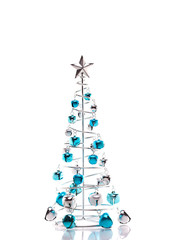 Christmas tree made out of blue and silver jingle bells