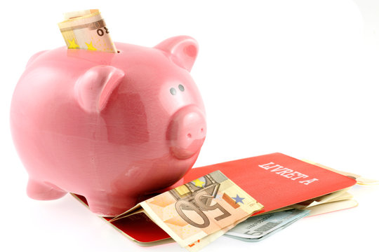 tirelire cochon rose, livret A et billets