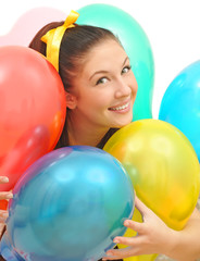 Fototapeta na wymiar girl smile a happy smile with balloons