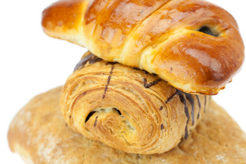 bread, roll with poppy seeds and roll with chocolate isolated on