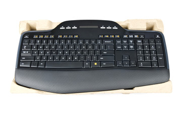 Black Computer Keyboard in a Cardboard Box