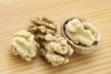 Walnuts on wooden surface