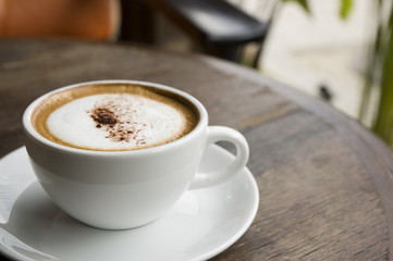 Hot cappuccino at outdoor cafe