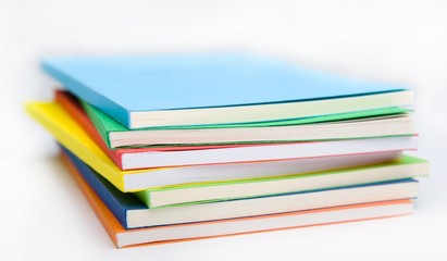 the stack of the coloured books
