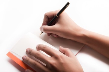 pen is being held in hand