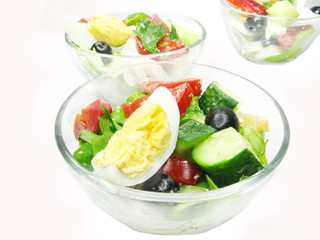 greek salad in bowls