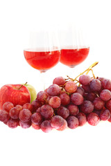 glass of wine and a bunch of grapes isolated on white
